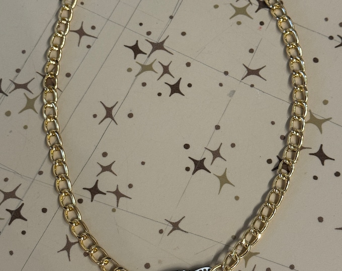 Gold boomerang necklace