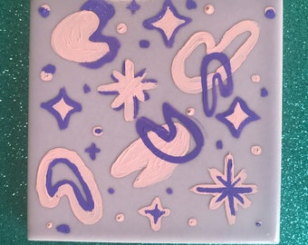 Atomic boomerang pink and purple coaster