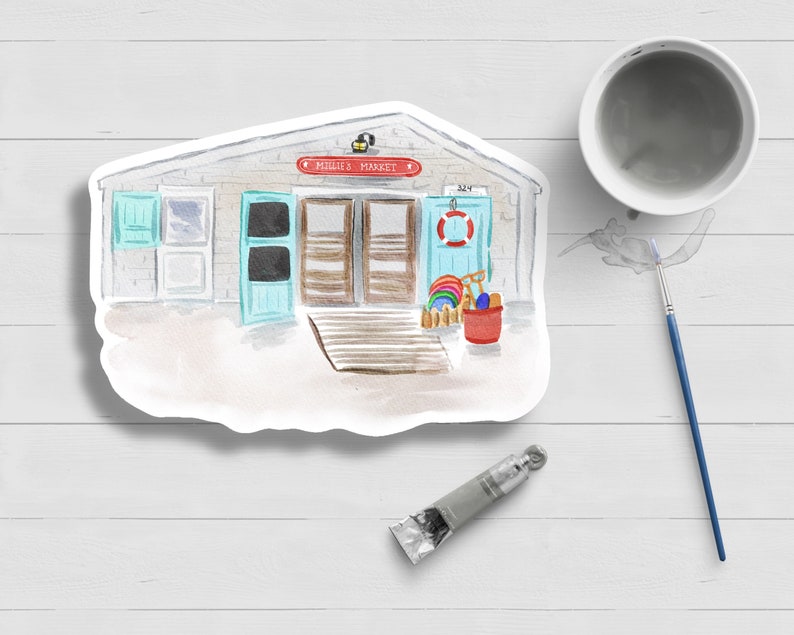 May include: A watercolor painting of a beach market with a red sign that says "Beach Market". The market has two blue doors and a window with blue shutters. There are beach toys and a red bucket in front of the market.