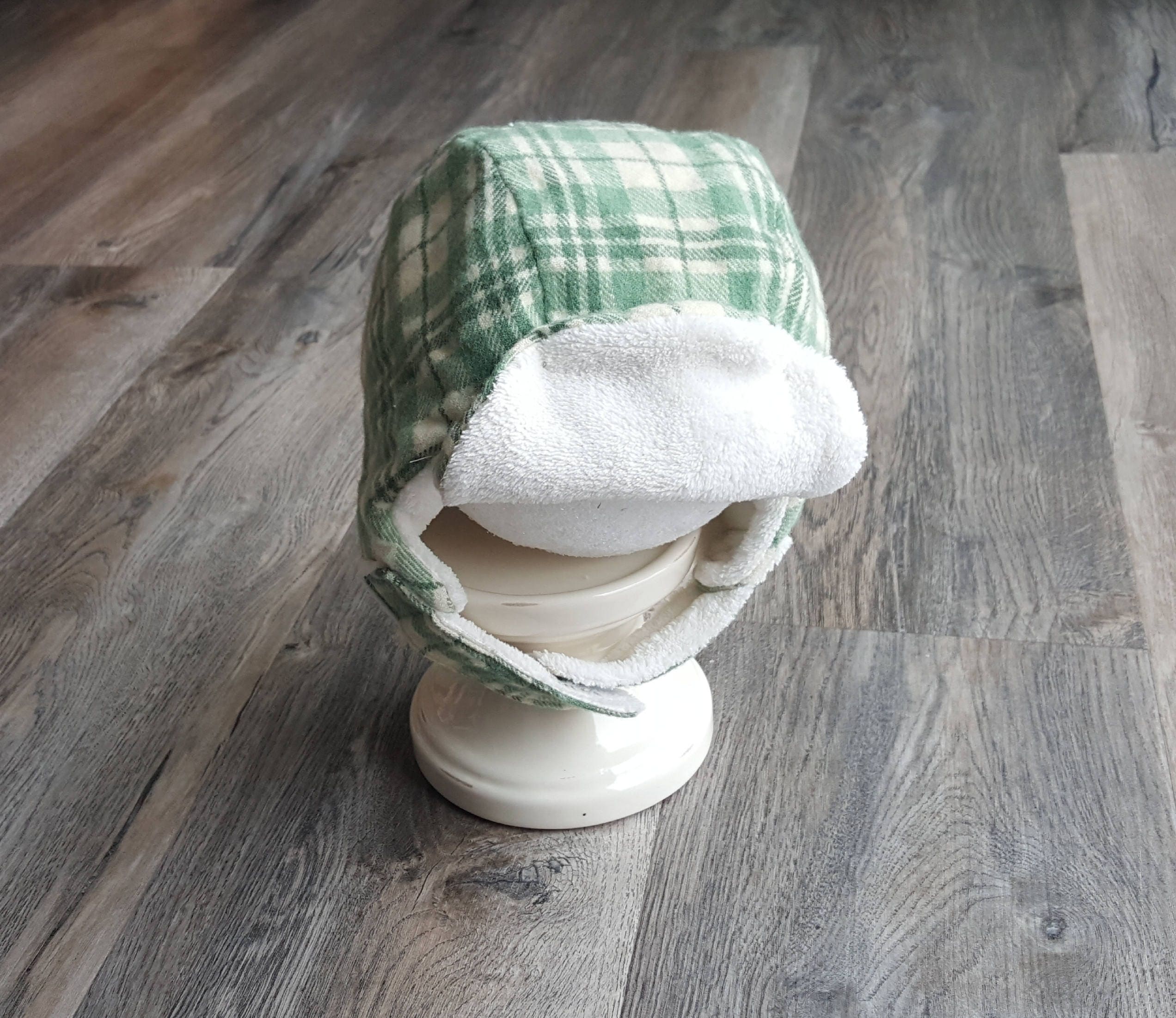green plaid hat with ear flaps