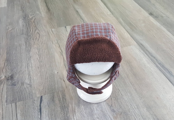 red flannel hat with ear flaps