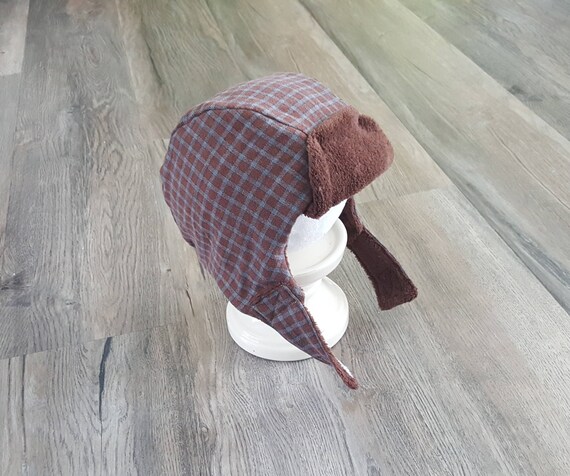 red flannel hat with ear flaps