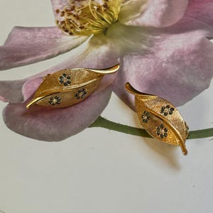 Boucle d'oreille argent pendante/fleur