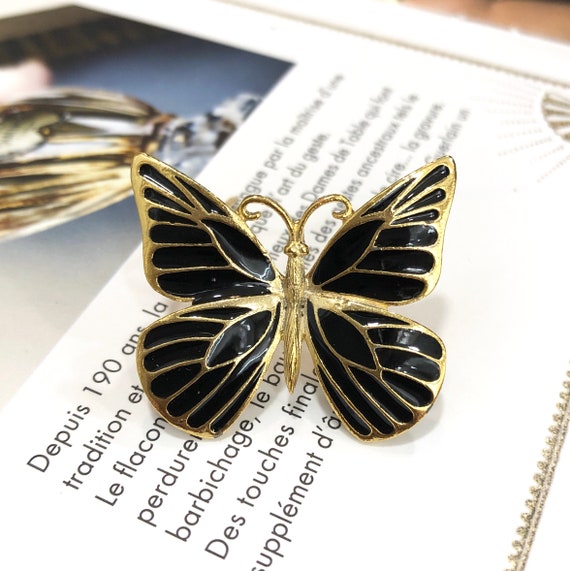 VINTAGE SPHINX Broche – Zwarte vlinder met gespreide vleugels