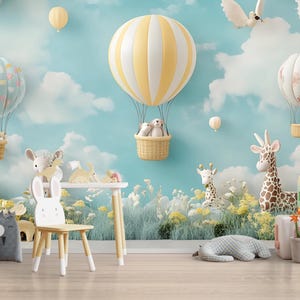 May include: A whimsical nursery scene with hot air balloons, clouds, and animal figures. The balloons are pastel-colored, and the scene includes giraffes, bunnies, and a panda-faced storage bin. A charming and playful design.