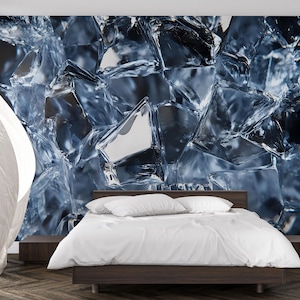 May include: A bedroom featuring a dark wooden bed frame with white bedding. The headboard wall is a mural of abstract, crystalline shapes in shades of blue and gray. A white curtain is visible on the left.