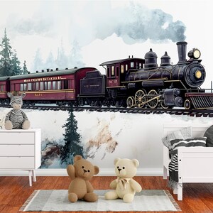 May include: A whimsical nursery scene featuring a vintage train mural, a white dresser, a bed, and stuffed animals. The train is black and maroon, set against a snowy mountain backdrop. The room has a cozy, inviting atmosphere.