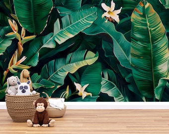May include: A vibrant green and white tropical leaf wallpaper creates a lush backdrop. A woven basket holds plush animal toys, including a bear, panda, and rabbit. A brown monkey sits in front of the basket, with a beige bowl and white cloth nearby.
