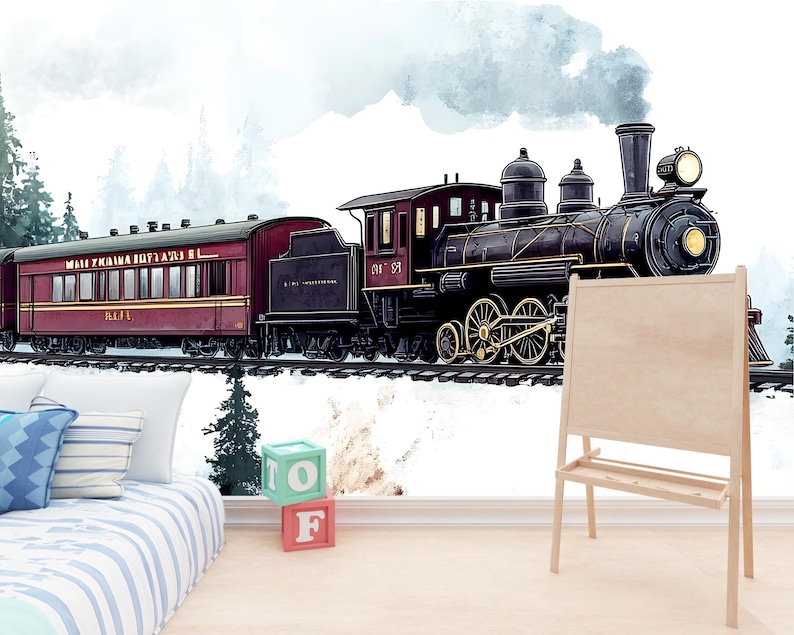May include: Watercolor illustration of a vintage steam train with a maroon passenger car and black engine. The train is on tracks in a snowy landscape. A wooden easel stands in the foreground, with a bed and blocks in the lower left.