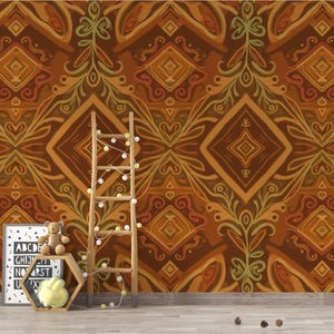 May include: A decorative wall mural with a repeating pattern in shades of brown, orange, and green. A wooden ladder with string lights leans against the wall. A framed alphabet print, a teddy bear, and a decorative hexagon shelf are in front.