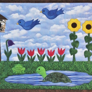 PDF pattern for Garden Friends quilt: features flowers, frog, turtle and birds