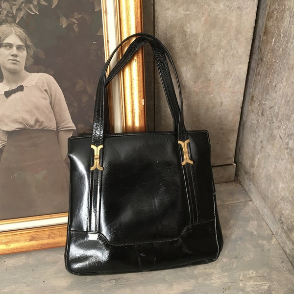 Sac à main en cuir verni des années 60