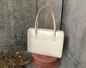 1950s cream handbag by Holzman