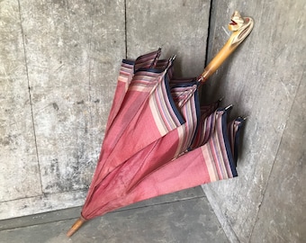 Umbrella with dog handle