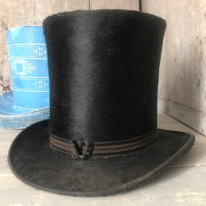 Antique top hat with its' original box from the mid 1800s