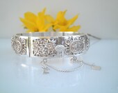 Signed VN Chinese Export Sterling Silver 1940 39 s Repousse Cuff Hinged Four Season Panel Bracelet