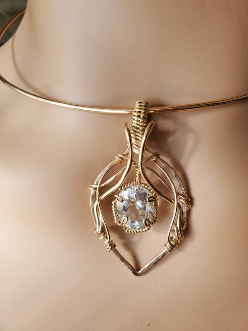 Faceted White Topaz Oval Pendant Uniquely Hand sculpted in yellow gold filled wire