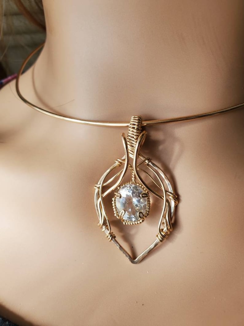 Faceted White Topaz Oval Pendant Uniquely Hand sculpted in yellow gold filled wire