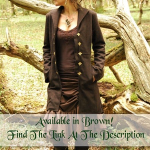 May include: A woman wearing a brown coat with gold buttons, a brown skirt, and black boots. She is standing in a forest with a tree behind her. The text "Available in Brown! Find The Link At The Description" is at the bottom of the image.