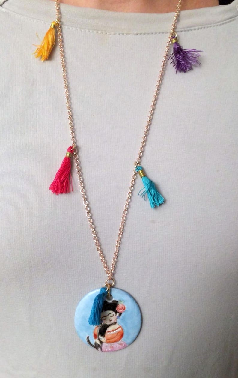 with coloured tassets and hand-painted porcelain medallion, Long necklace in gilded brass