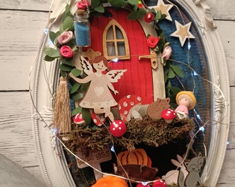 Decorative frame with fairy door