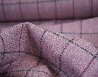 May include: Pink and black plaid fabric with a soft, textured feel.