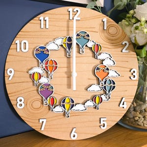 Hot air balloon themed wall clock. Bedroom, nursery art, time teller.