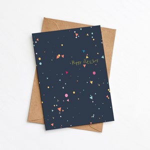 Modern navy birthday card with multicoloured geometric print, and Happy Birthday message in yellow font by Greenwich Paper Studio.