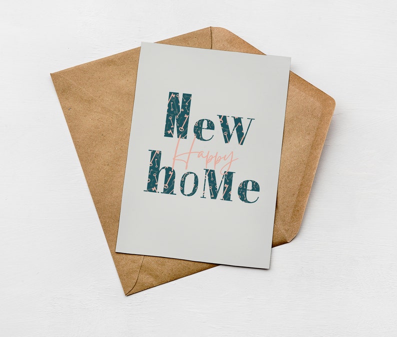 Greenwich Paper Studio, modern & minimal style 'happy new home' card with patterned text and key illustrations, styled laying flat on a brown Kraft envelope.