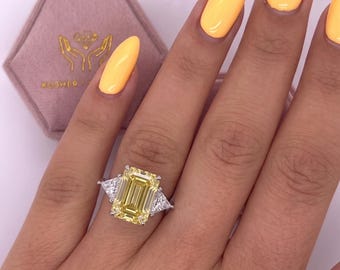 6 Carat Total Weight Vivid Yellow VVS2 IGI Certified Three Stone Emerald Cut Lab Grown Diamond Engagement Ring Side Trillions 18k White Gold