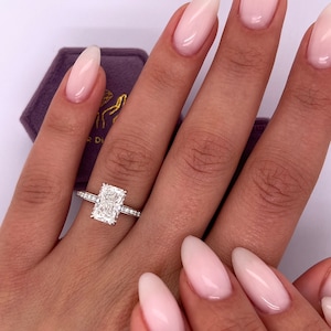 3 Carat E Color VVS2 Clarity IGI Certified Radiant Cut Lab Diamond Engagement Ring, Hidden Halo & 3 Sides of Round Diamonds 18k White Gold