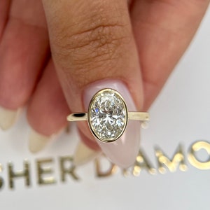 2.5 Carat IGI Certified E Color VVS2 Clarity Oval Cut Lab Grown Diamond Bezel Set Solitaire Engagement Ring 14k Yellow Gold