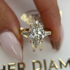 5.7 carat IGI Certified F Color VS1 Clarity Marquise Cut Lab Grown Three Stone Diamond Engagement Ring Side Baguettes 18k Yellow Gold