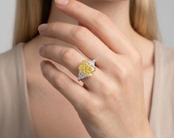 Fancy Vivid Yellow VVS1 Clarity 9.26 Carat Total Radiant Cut Lab Grown Diamond Three Stone Engagement Ring Side Trillons 18k Two Tone Gold