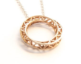 Signature Mobius Twist Geometric pendant, Rose gold plated.