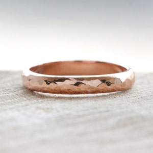 Rustic hammered wedding band in 9ct rose gold with a polished finish, ladies wedding ring handmade in the UK