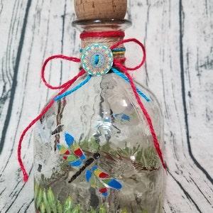 Decorated Patron bottle, painted/embellished image 1