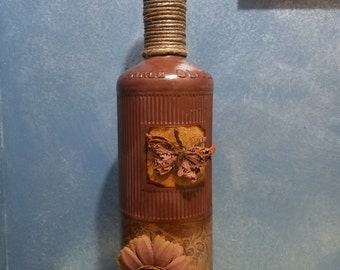 Decorated liquor bottle, painted/embellished