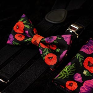 May include: A set of three ceramic nesting bowls in shades of blue, green, and white. The bowls feature a speckled glaze and a simple, modern design. The largest bowl measures approximately 6 inches in diameter.