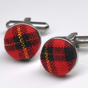 Gemelli in argento con gemelli in tessuto di cotone natalizio in tartan rosso verde oro