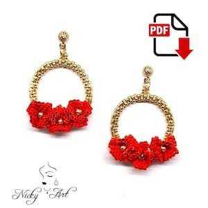 Può includere: Un paio di orecchini a cerchio dorati con fiori rossi perlati. Gli orecchini sono realizzati con piccole perline e hanno un aspetto delicato e femminile.