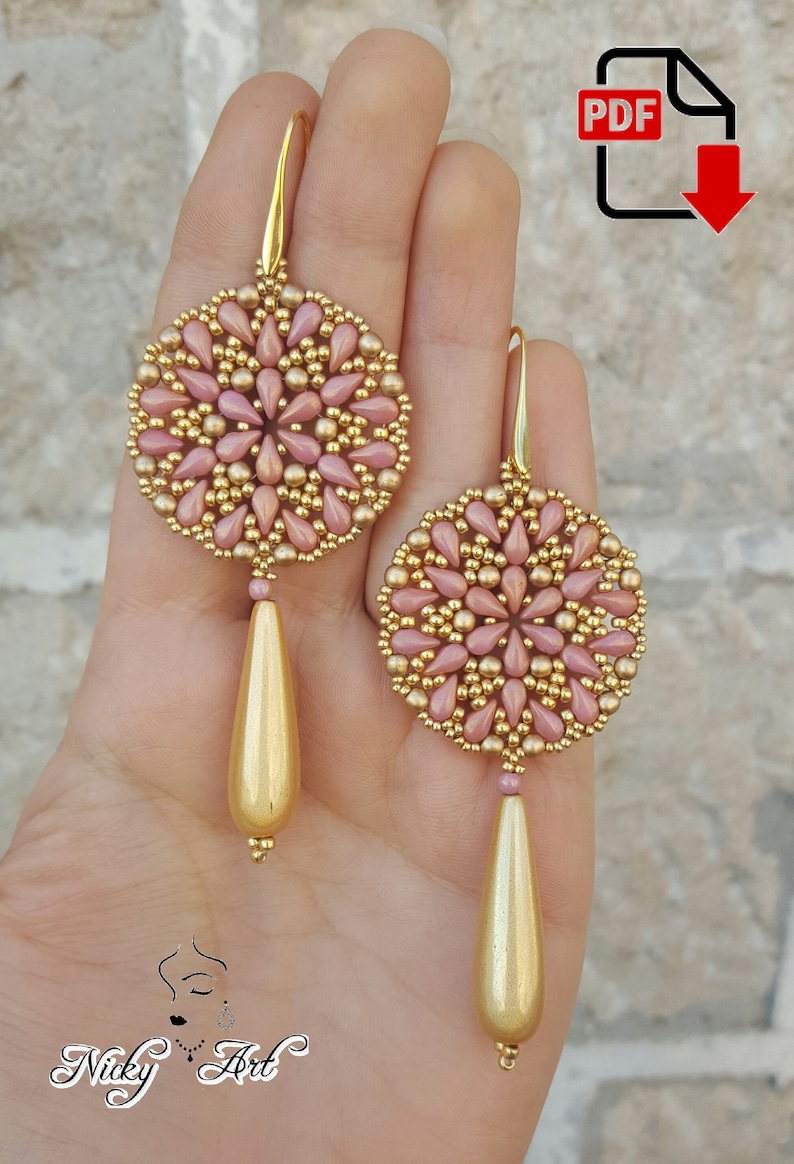 May include: A pair of gold and pink beaded earrings with a teardrop-shaped pendant. The earrings are made with small seed beads and feature a delicate floral design.