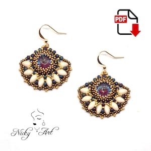 May include: A pair of gold earrings with a white and blue beaded design. The earrings feature a large iridescent crystal in the centre.