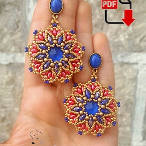May include: Handmade beaded earrings with a floral design. The earrings feature a central blue stone, surrounded by red, gold, and blue beads. The earrings are held in a hand. The image also includes the text "Nicky Art" and a PDF download icon.