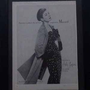 May include: A black and white photo of a woman wearing a printed silk and linen dress and a coat. The text "Harmony in printed silk and linen composed by Maxwell interpreted by Adele Simpson a prelude for spring" is visible in the image.