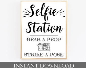 May include: A printable sign that says "Selfie Station" with a camera graphic and the text "Grab a prop, Strike a pose". The sign is available in 5x7, 8x10, and 11x14 sizes.