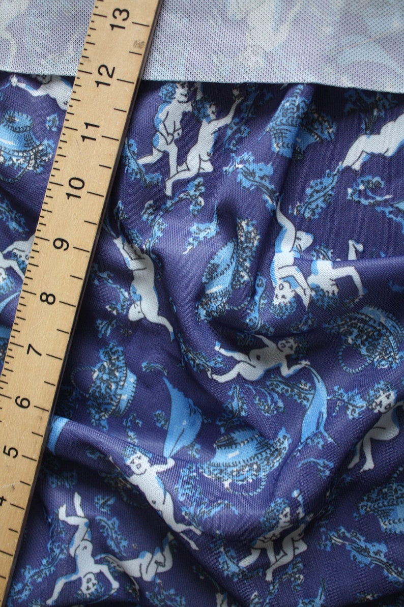 1.9 yard 1960s fabric By yard cherubs white flowers in blue Printed Synthetic Material