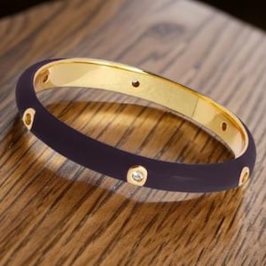 Black and Gold Enamel Ring with Stones