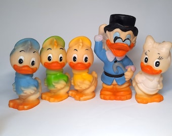 Scrooge McDuck, A character in cartoons, fairy tales and comics. The protagonist of the Disney animated series &quot;Duck Tales&quot;