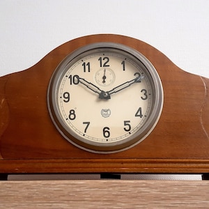Wooden desk clock. Vintage mantel clock USSR 1950s. Mechanical watch. Old clock with key. Retro style Vladimir plant clock.